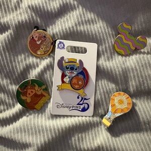 A lot of collectible Disney pins from parks mystery & 25th anniversary stitch